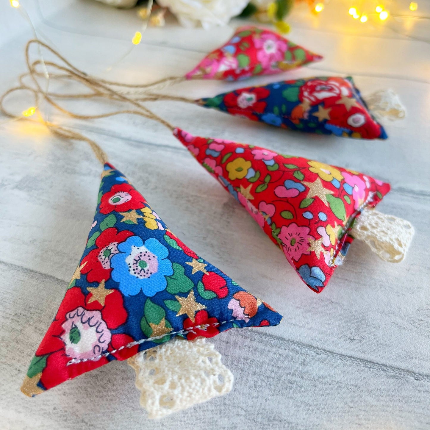 Christmas Tree Decorations Handmade in Liberty Betsy Star Fabric. Set of 2 or 4